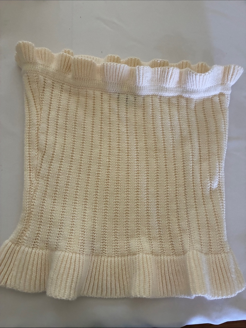 Lumiere Cream Ribbed Knit Mini Skirt with Ruffle Edges